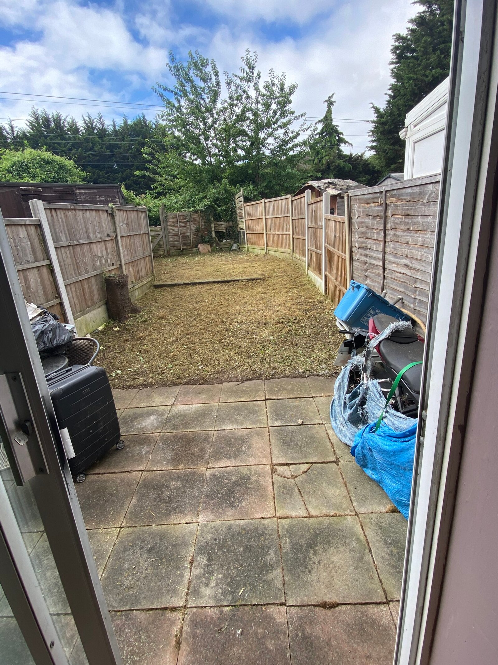 Garden cleared of unwanted items after clearance